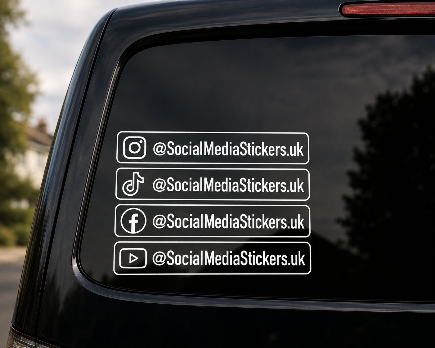 Custom social media handle sticker on a vehicle window